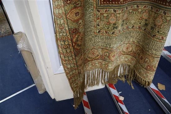 A Turkish Kum Kapri silk red ground hanging prayer rug, 6ft 6in by 4ft 6in.